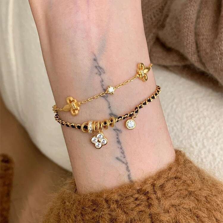 Vintage Style Four-Leaf Clover Black Gold Braided Bracelet for Women Luxurious High-End Feel Personalized Versatile Design Jewelry