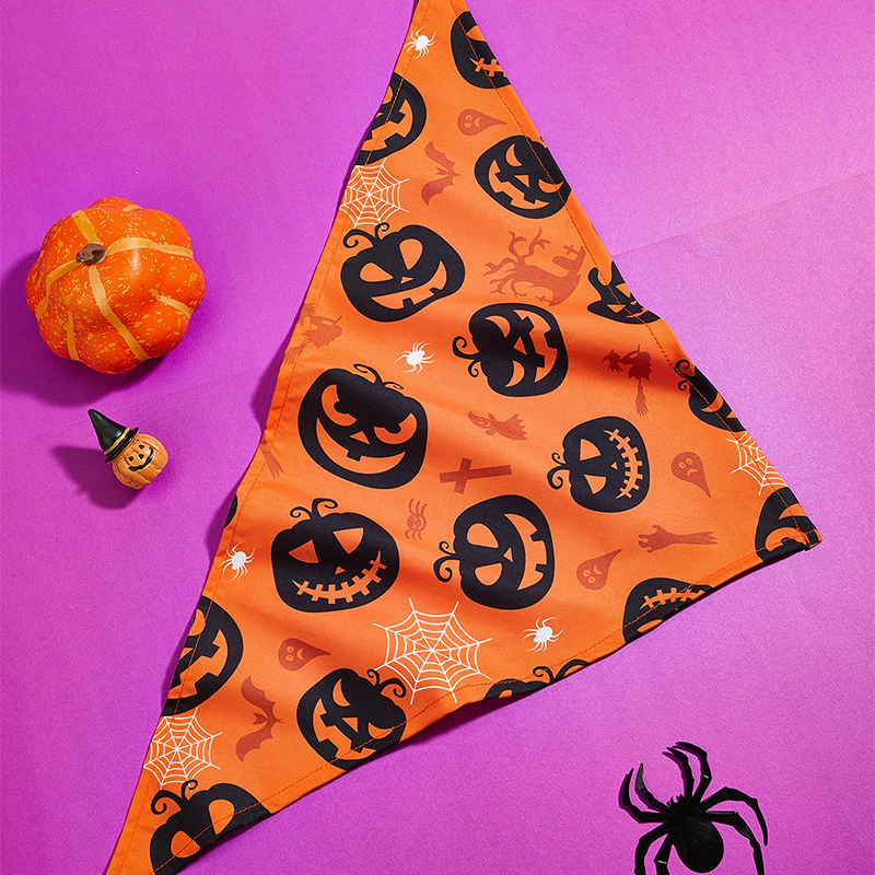 Halloween themed pet bib with an evil pumpkin design