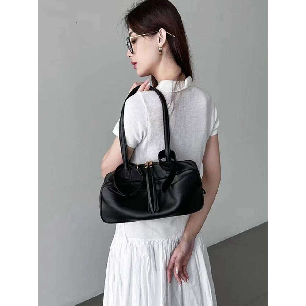High version genuine leather pillow 2025 new all-match large capacity first layer cowhide bowling bag for women