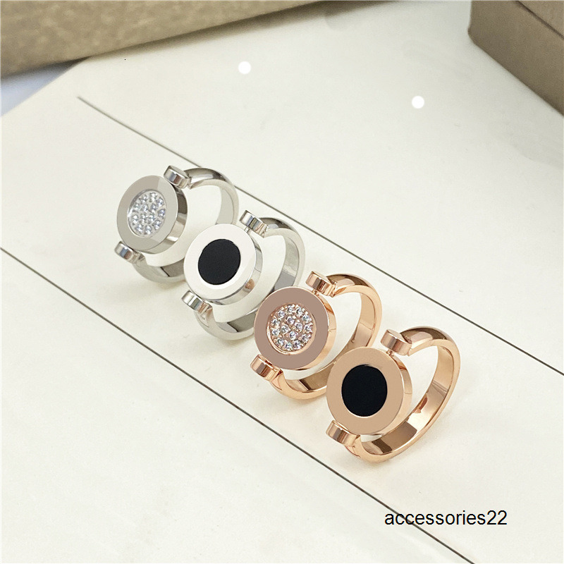 Band Rings Titanium stainless steel couples fashion round cake classic ring doublesided black and white studded couples ring ring.