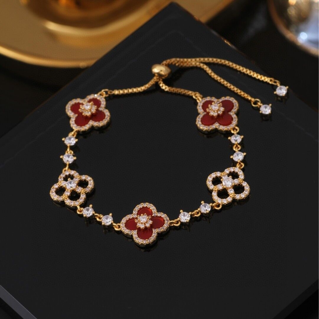 Luxury Brand Designer Jewelry Exquisite Diamond-Studded Shiny Imitation Natural Pink Shell Hollow Lucky Four-Leaf Clover Pull Bracelet For Women Niche