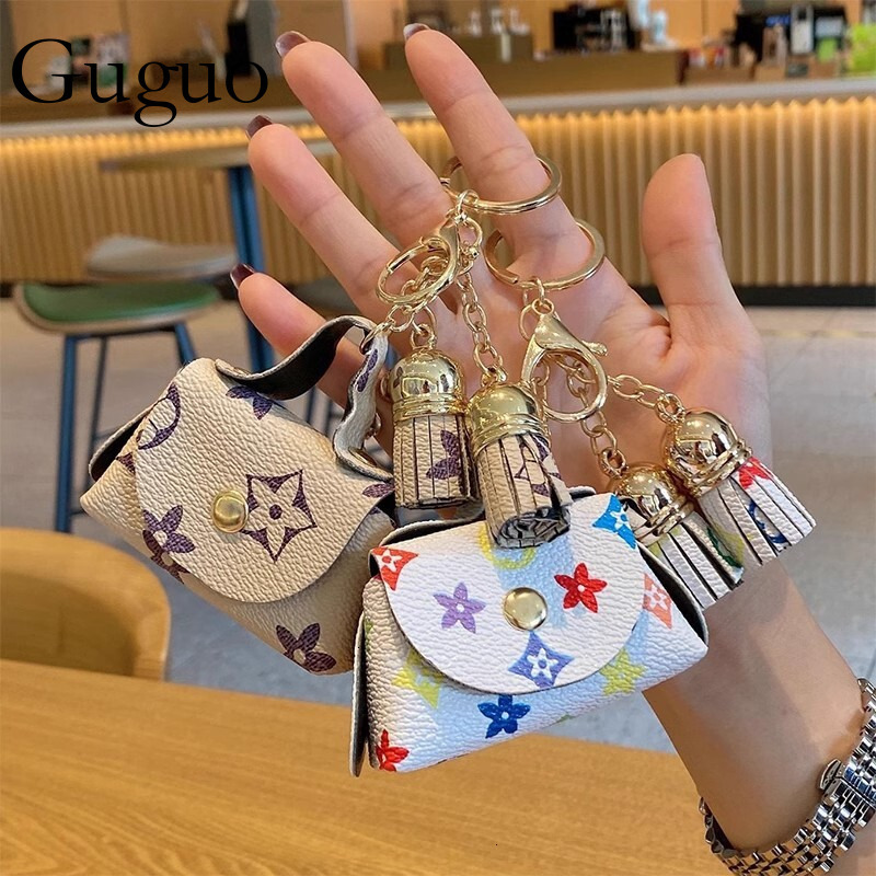 Guguo Free Shipping Designer Luxury Cute Mini Leather Small Bag Coin Purse Earphone Bag Storage Bag Old Flower Pendant Key Card Holder Key Bag For Women