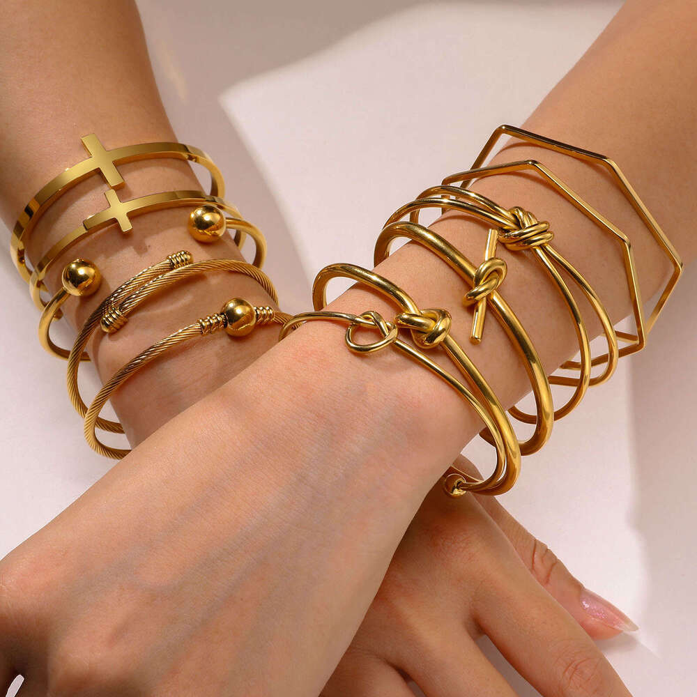 new gold tone bracelet designer bracelet for women Open Bracelet Luxury Jewelry Fashion Simple Geometric Stainless Steel Knot C-shaped Cross border Ac