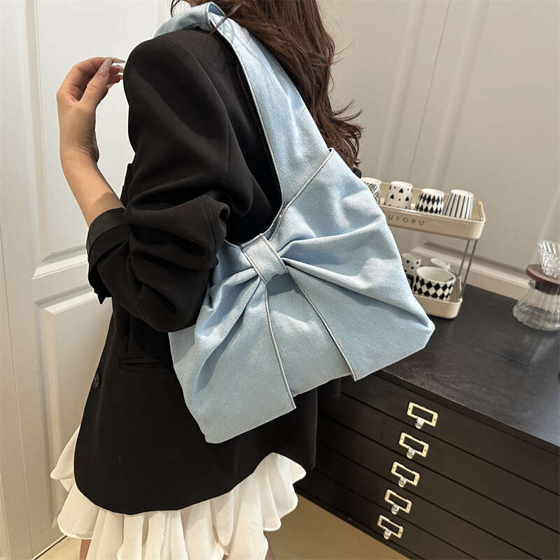 2025 Designer Bags New Fashion Simple Denim Single Shoulder Handbag Cute Exquisite Bow Niche Commuter Tote Bag