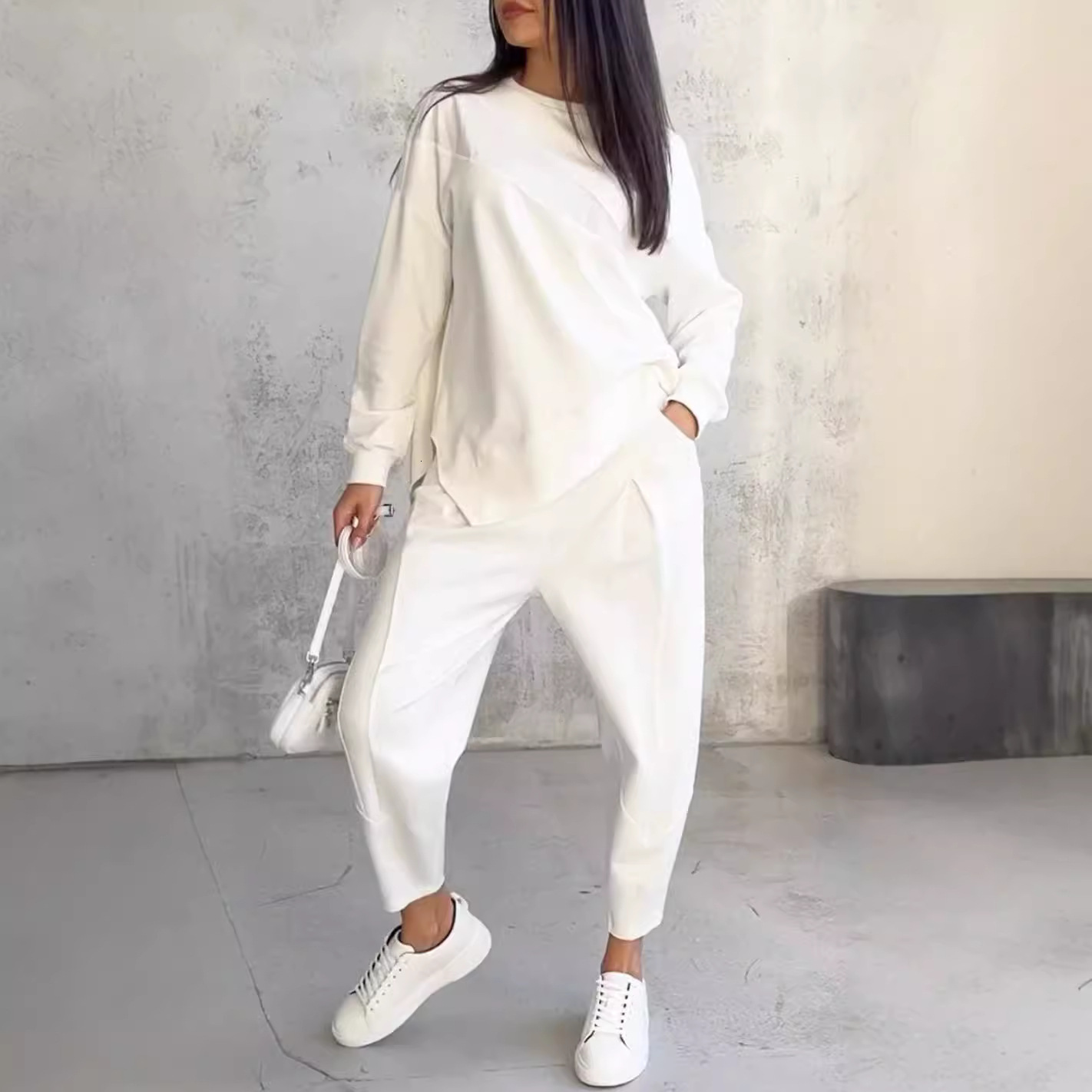 2025 autumn and winter casual round neck loose irregular long sleeved sportswear set, new designer knitted clothing for autumn and winter