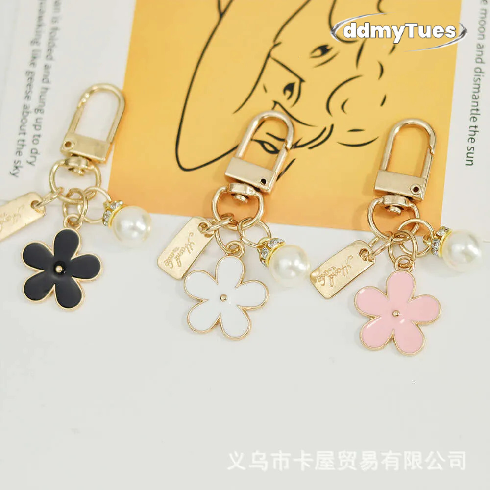 INS Metal Daisy Pearl Keychain Niche Flower Bluetooth Earphone Case Accessories TUES