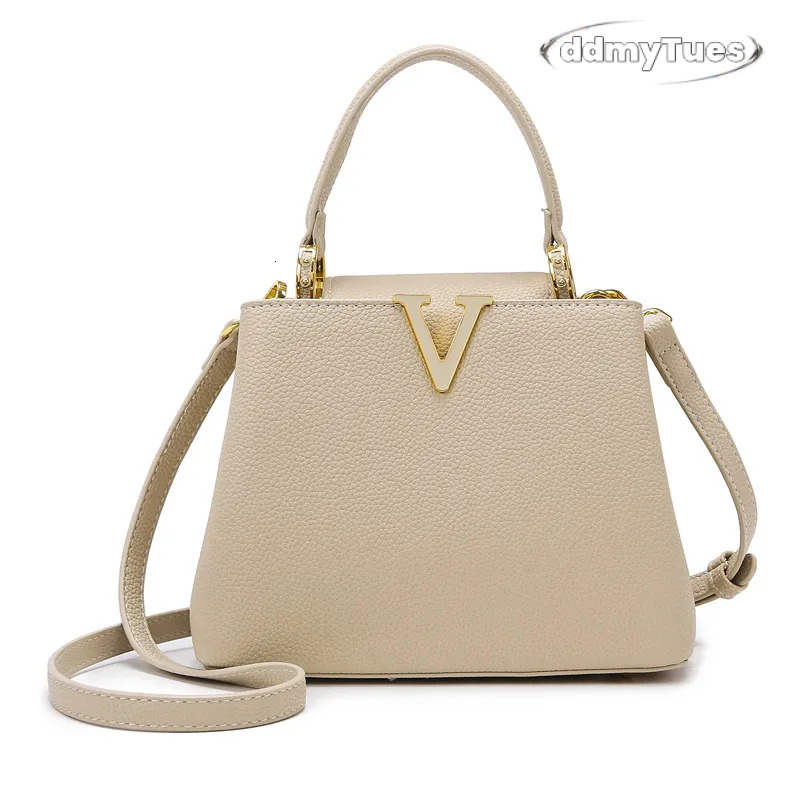 new Free shipping designer bag Shoulder tote Bags For woman Minimally designed commuting with diagonal winds TUES