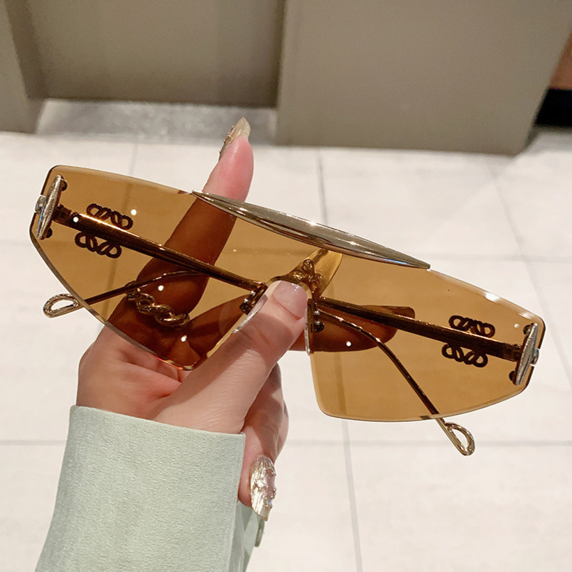 New Frameless Men, Trendy Ins Style, Fashionable and Unique Cat Eye Sunglasses for Women high quality