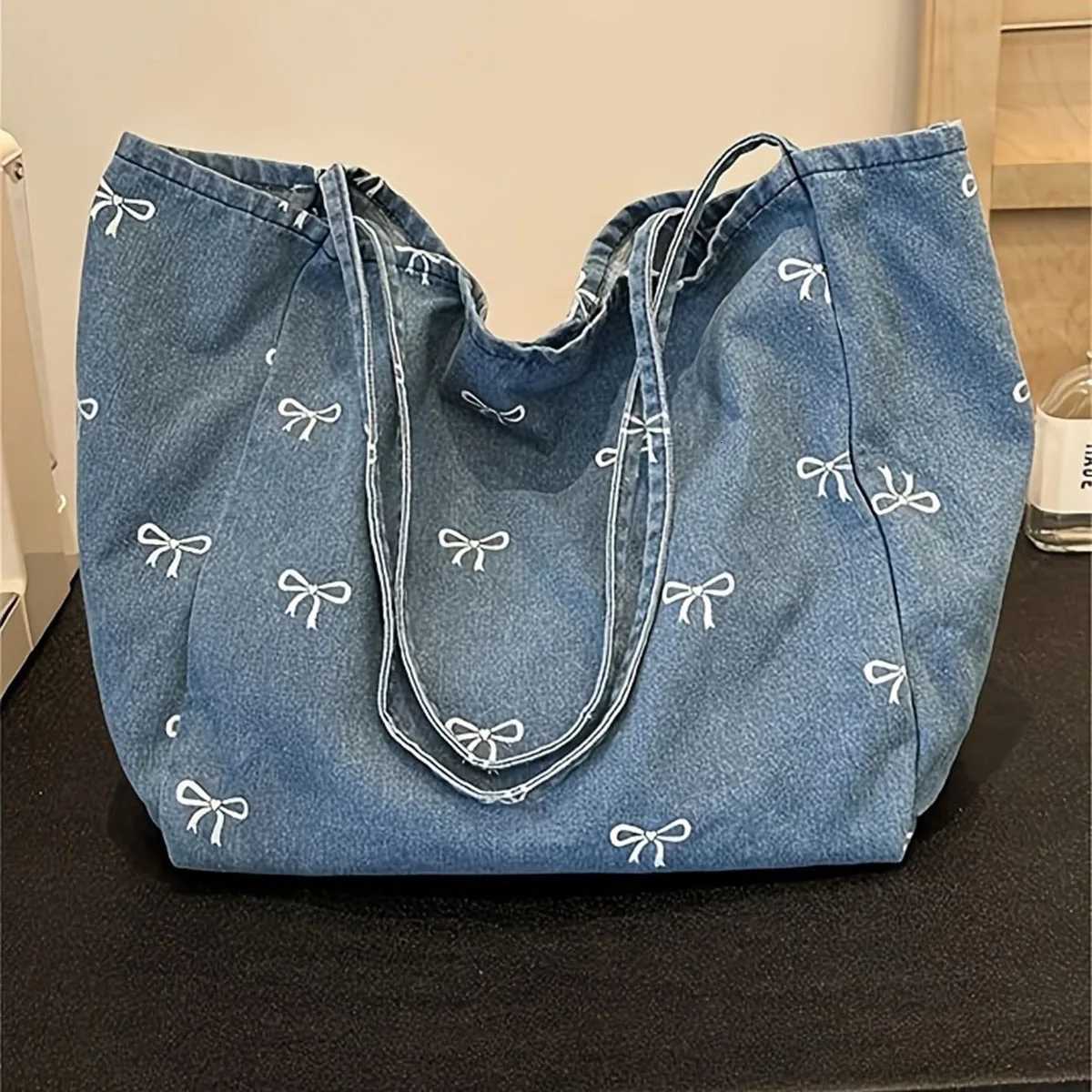 Highquality denim canvas bag ladies bow sweet and versatile tote bag largecapacity casual singleshoulder bag Z250911