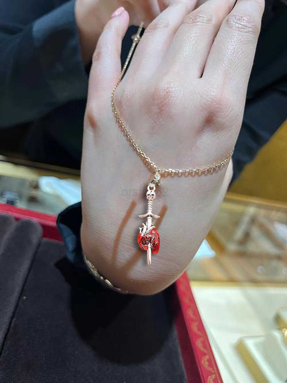 20Pcs Tibetan Devil Heart Sword Through Heart CharmsPunk Skull Sword Necklace Bulk Gothic Skull Skeleton Charms for Making Necklace Keychain s Earring