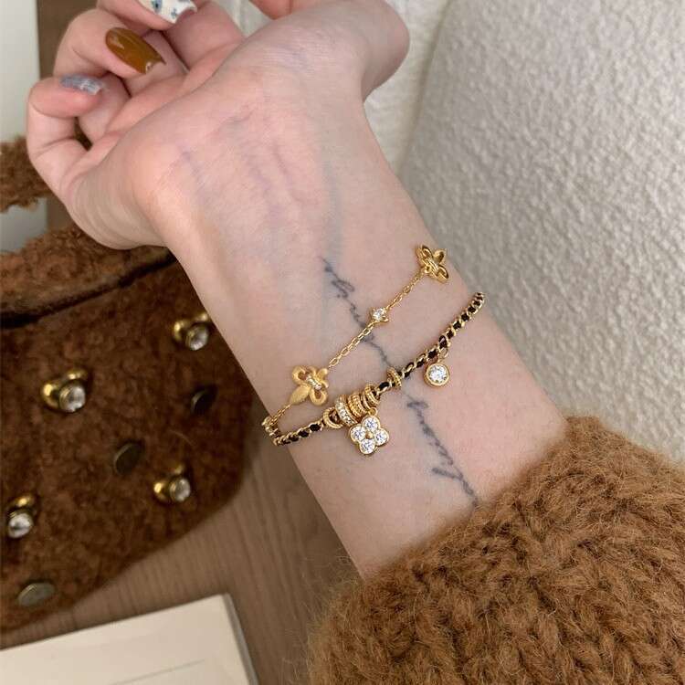 Vintage Style Four-Leaf Clover Black Gold Braided Bracelet for Women Luxurious High-End Feel Personalized Versatile Design Jewelry
