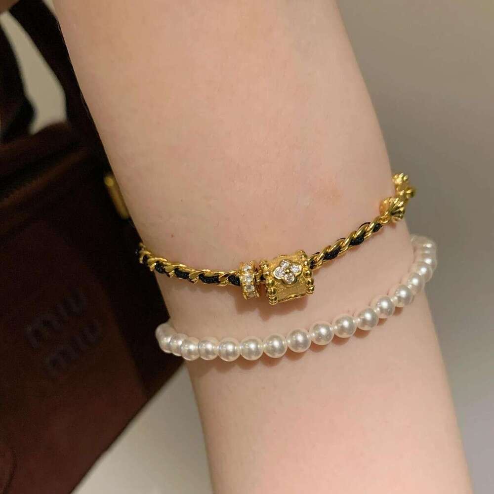 Light High-End Feel Slim Waist Black Gold Woven Bracelet for Women, Unique and Versatile Hand Chain with Distinctive Niche Design