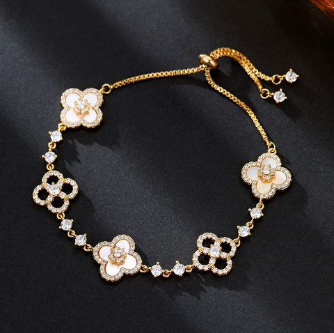 Luxury Brand Designer Jewelry Exquisite Diamond-Studded Shiny Imitation Natural Pink Shell Hollow Lucky Four-Leaf Clover Pull Bracelet For Women Niche