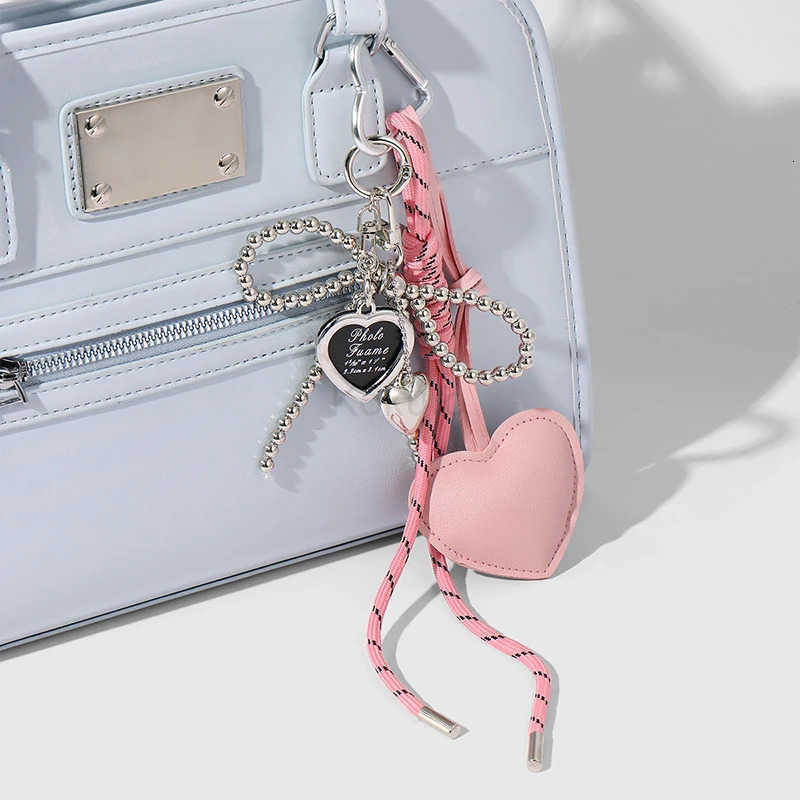 Luxury Charm Tassel Love Heart Pendant Handmade Creative Bowknot Keychain Cute Glossy Pendant Keychain Bag Accessories M250912