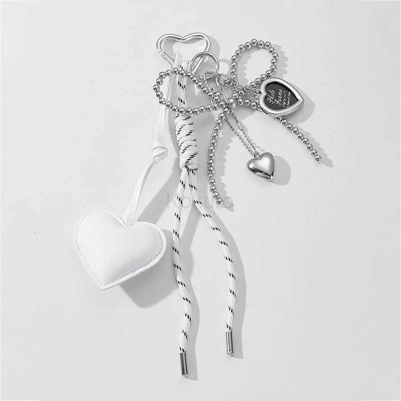 Luxury Charm Tassel Love Heart Pendant Handmade Creative Bowknot Keychain Cute Glossy Pendant Keychain Bag Accessories M250912