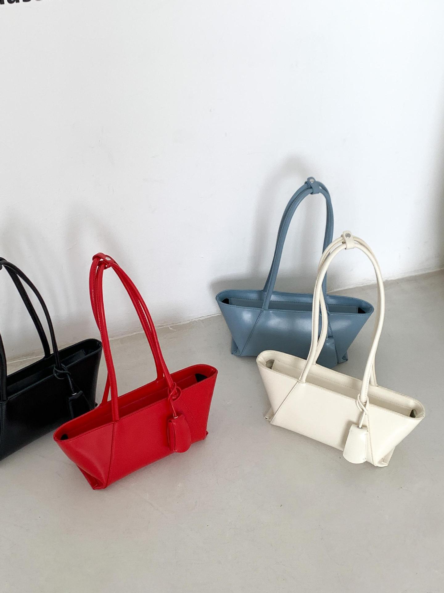 Free shipping designer bags for womens Shoulder black red white brown Versatile and trendy one shoulder light luxury tote bag
