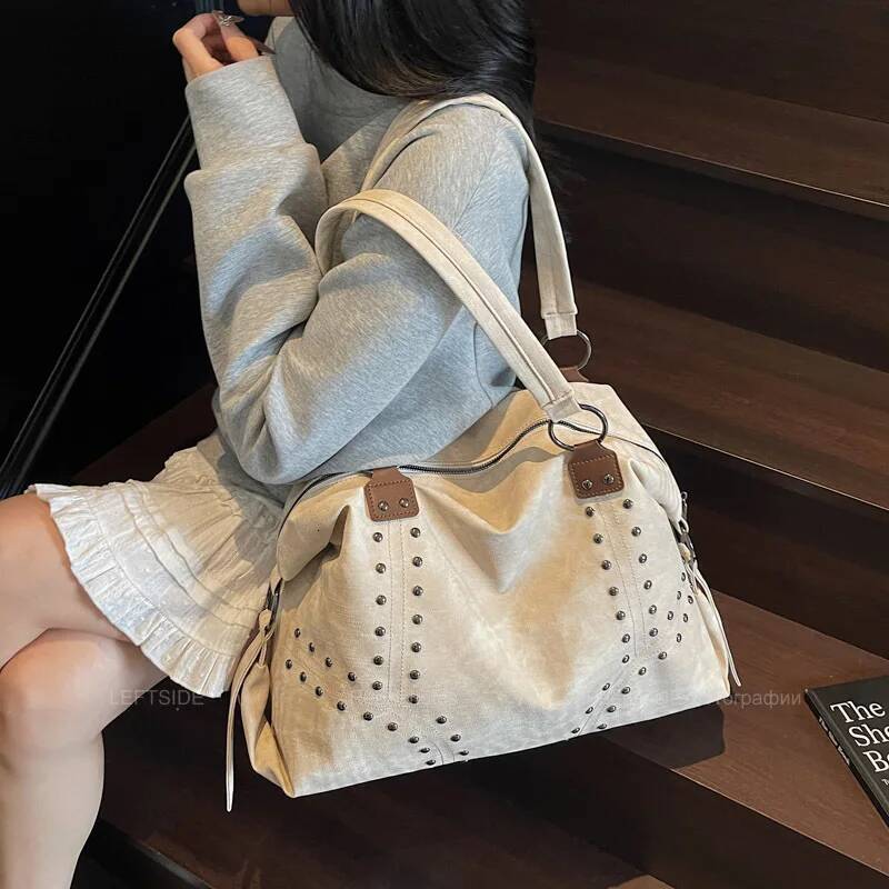 Large Capacity Rivet PU Leather Women s Pillow Bag Trendy Spicy Girl Women s Handbag Short Distance Travel Bag Women s Shoulder Bag Designer Bag