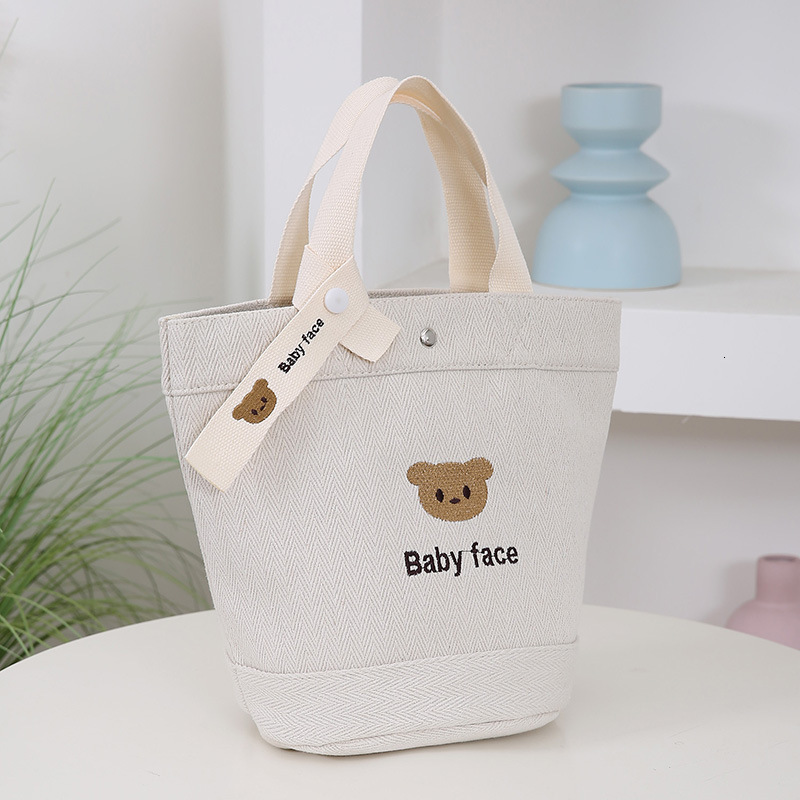 New Free Shipping Simple Handbag Fabric Bag Embroidered Bear Office Worker Student Canvas Luxury Designer Bag Bag Tote Bag Lunch Box Versatile