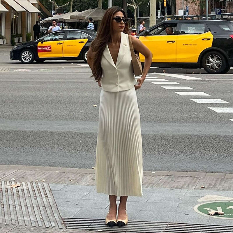 European and American Cross-Border Design Women's Fashion Summer New Suit Collar Blazer Vest Top Mid-Length Pleated Skirt Set