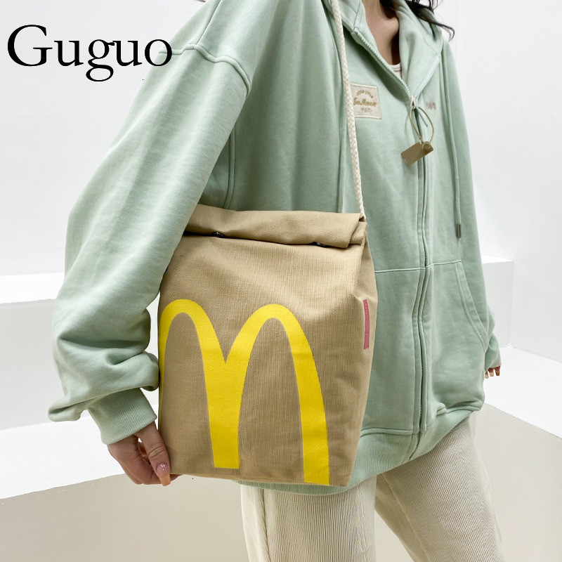 Gu Guo Free Shipping New Designer Bag Mcdonald's Backpack Paper Bag Printed Lunch Box Bucket Bag Casual Drawstring Bag Shoulder Bag