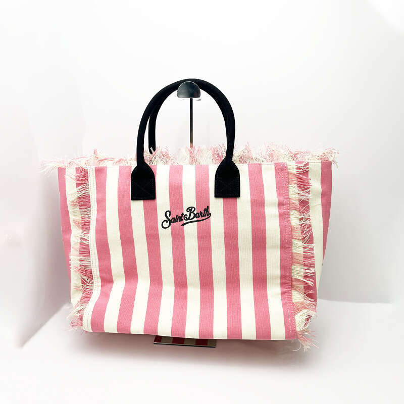 New women's high-capacity leisure travel canvas striped handmade tassel handbag tote bag from Santa Bart Europe America, new style, unique and el