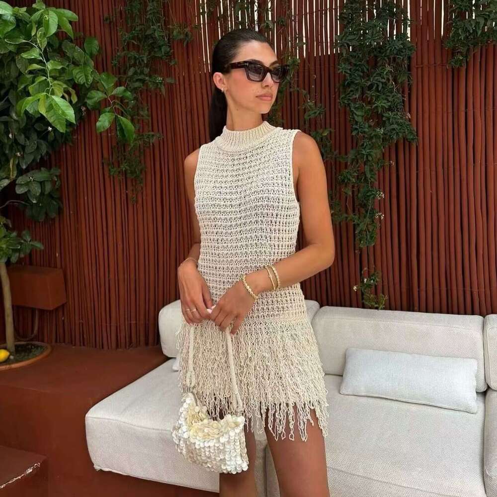 DHEssentials Autumn New Women's Fashion Small Fragrance Style Knitted Vest with Tassel Decoration Sleeveless Round Neck Hollow Short Dress