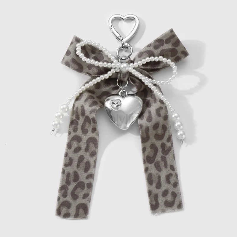 Y2k Fashion Leopard beads Ribbon Love Bow Keychain Imitation pearl Key Ring Student Womens Charms Bag Backpack Pants Decoration M250912