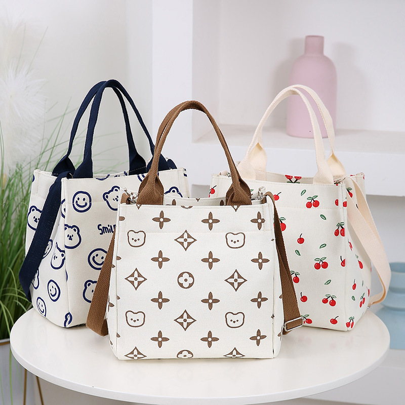 New Canvas Single Shoulder Designer Bag Handbag Fashion Lunch Luxury Bag Box Free Shipping Mommy Bag Simple Compact D Handheld Bag Commuter Bento Bag