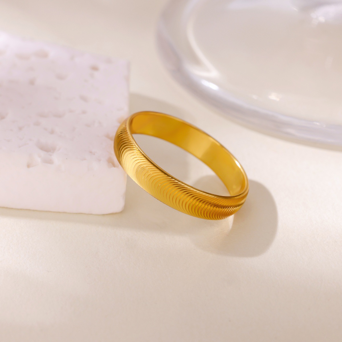 Elegant Crystalline Band: Stylish Gold Wide Bracelet Embellished with Shimmering CZ Stones