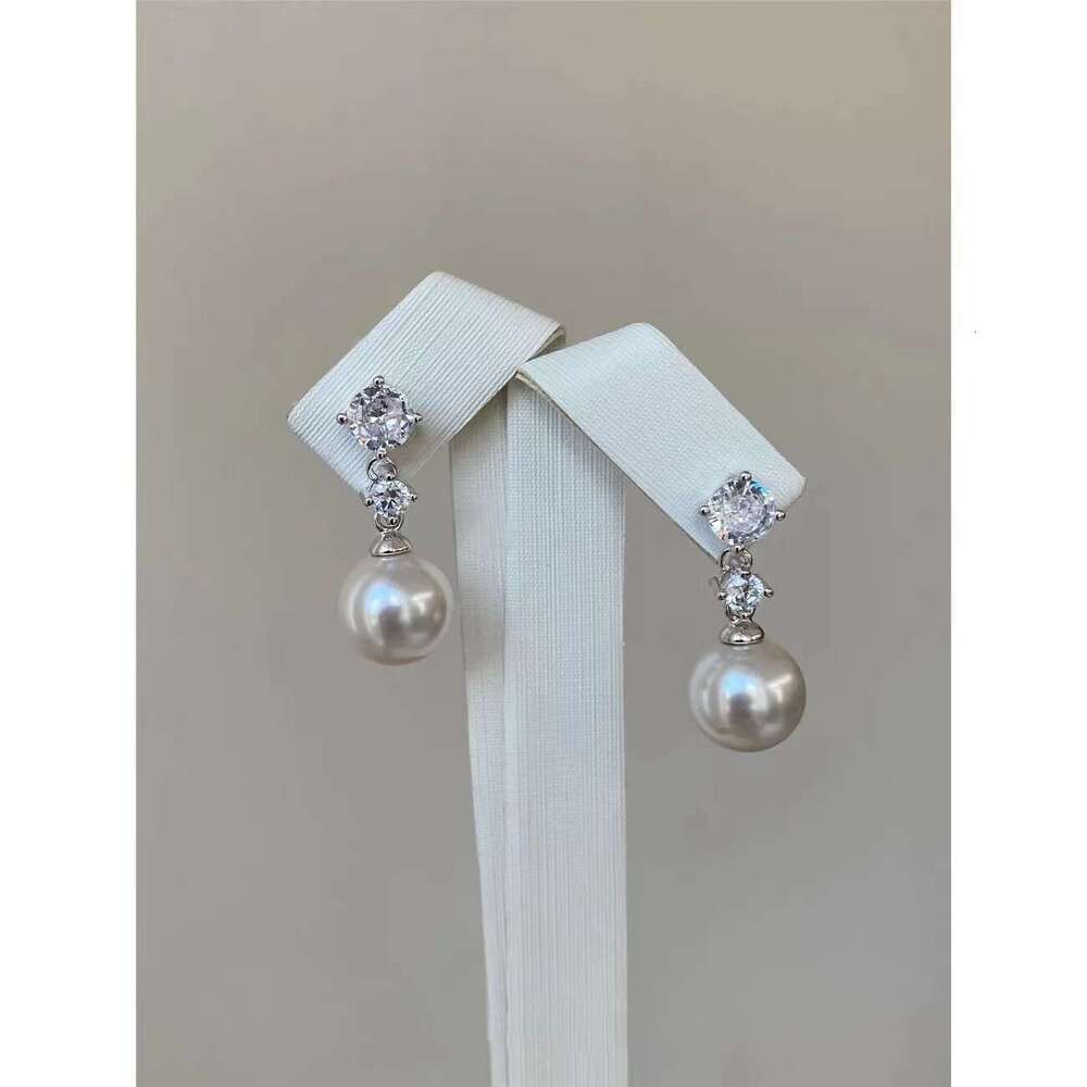 2023 New Ins Style Smart Flashing Pearl Zirconia High-end Light Personality Earrings for Women