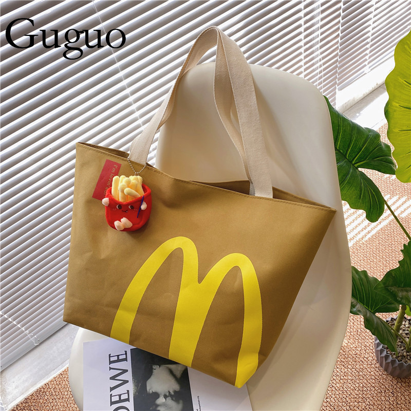 Gu Guo Free Shipping New Designer Bag Mcdonald's Backpack Paper Bag Printed Lunch Box Bucket Bag Casual Drawstring Bag Shoulder Bag