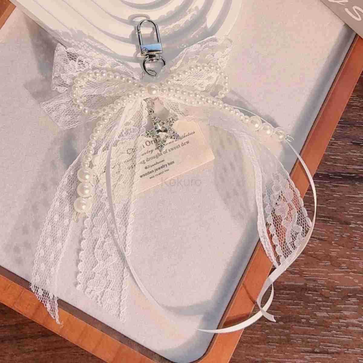 Lace bow Keychain Hollow Red Ribbon Cherry Y2k Fashion Design Charm Delicate Backpack Key Chain Valentines Day Gift Accessories M250912