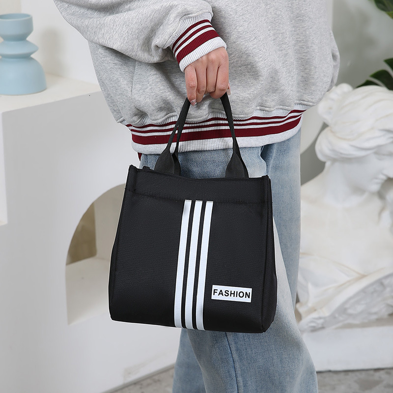 Luxury Bag New Casual Free Shipping Handheld Designer Bag Makeup Bag Toiletry Bag Work Lunch Bag Handheld Mommy Bag With Water Resistant Feature