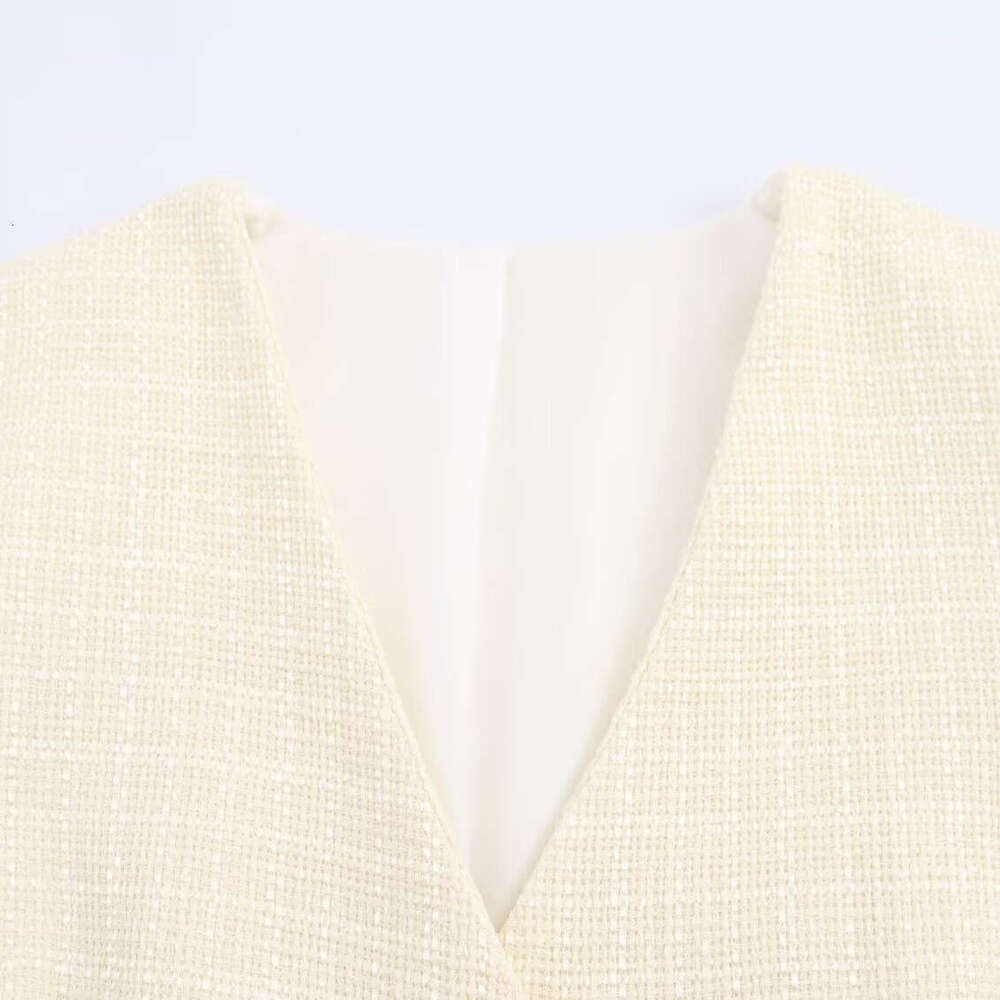 DHEssentials 2025 Autumn New Women's Fashion Simple Style Unique Buckle Decor Small Fragrance V-neck Top Apricot Color