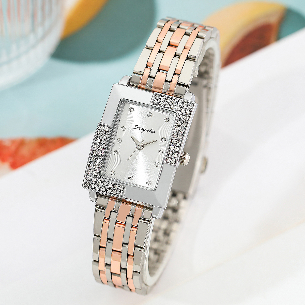 Luxury Female Timepiece: Sparkling Square Case & Dazzling Bezel Design