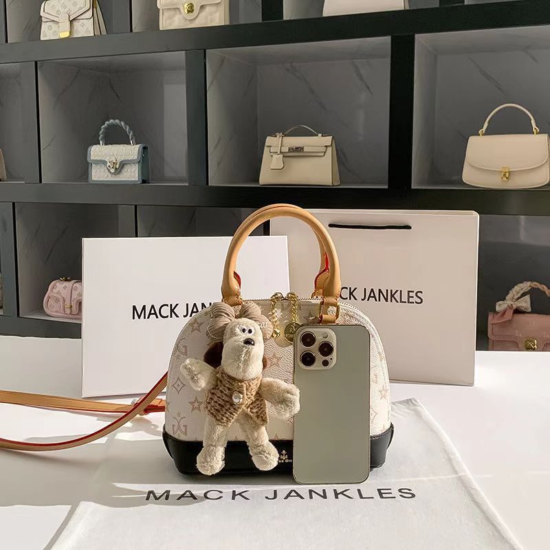 Free Shipping 2025 Designer Shell-Shaped Clutch Bag - Unique Monogram Shoulder Purse for Women, Chic Convertible Top Handle Crossbody Bag