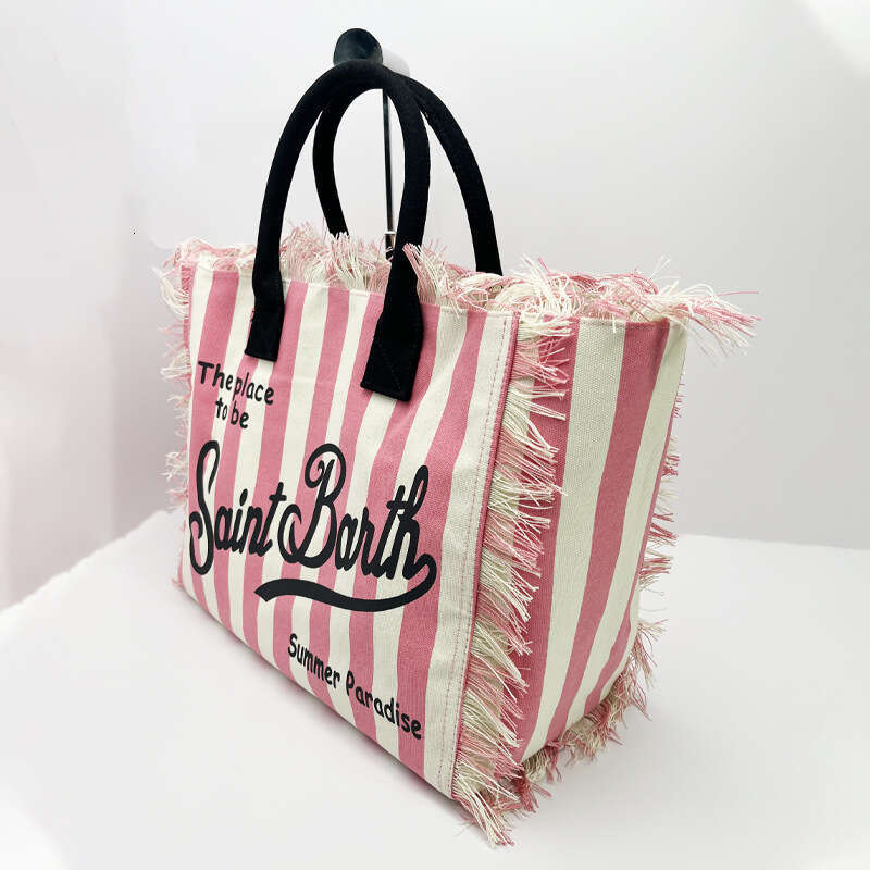 New women's high-capacity leisure travel canvas striped handmade tassel handbag tote bag from Santa Bart Europe America, new style, unique and el
