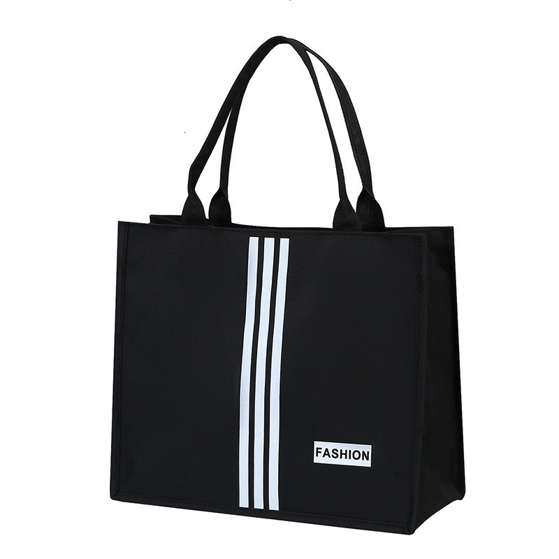 Spring New Fashion Luxury Bag Tote Bag Portable Lunch Bag Large Designer Free Shipping Bag Capacity Simple Storage Bag