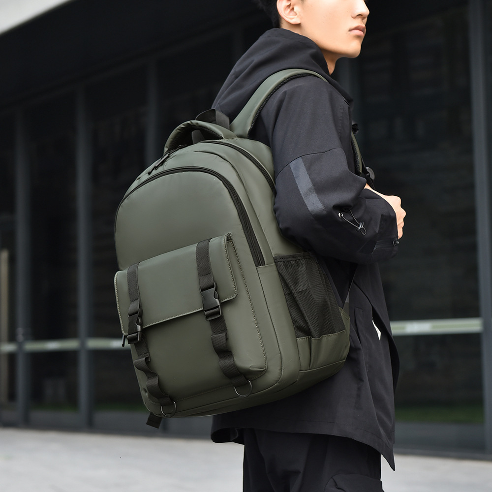 Factory Direct New Versatile Large Capacity Free Shipping Men S Backpack Casual Fashion Designer Bag Backpack Luxury Bag Large Capacity Travel Bag