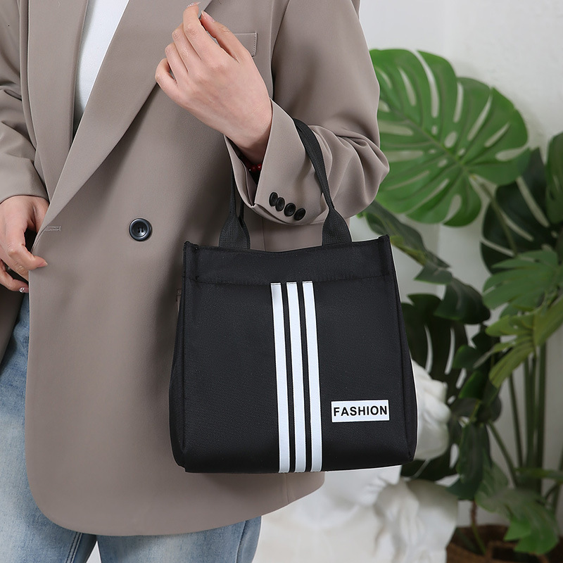 Luxury Bag New Casual Free Shipping Handheld Designer Bag Makeup Bag Toiletry Bag Work Lunch Bag Handheld Mommy Bag With Water Resistant Feature