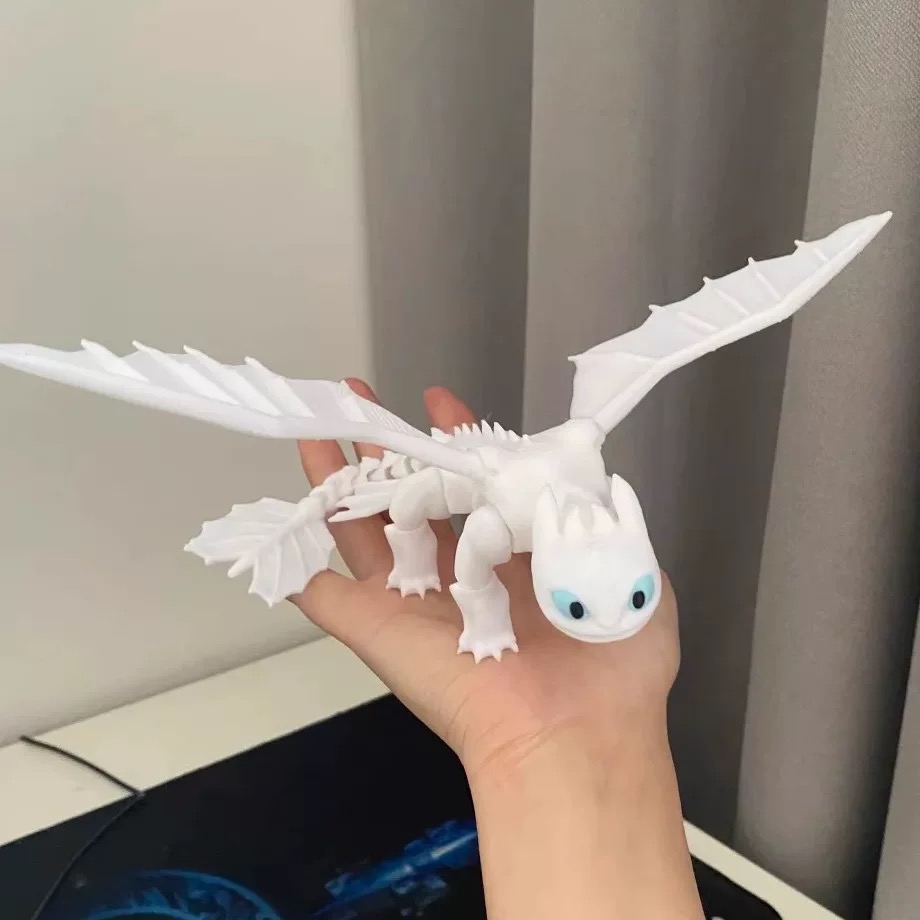 3D Printed Toothless Toy Doll: Articulated, Multi - colored Figurine Model