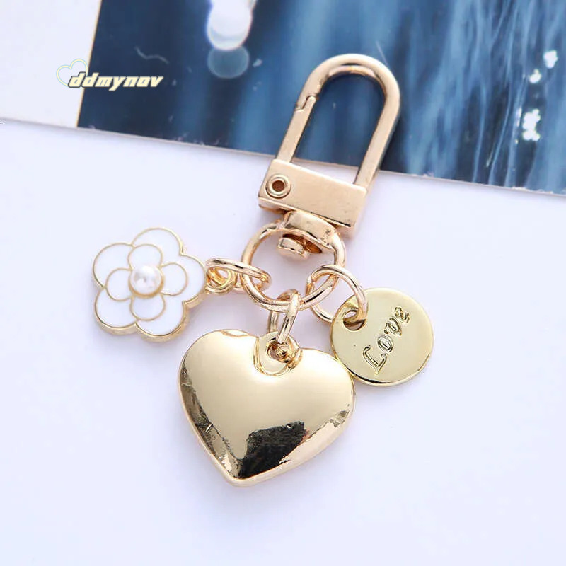 _wholesale Adorable Alloy Heart Keychain - Pearl & Camellia Flower Charm with Letter Pendant, Cute Bag Accessory for Women (8cm, 12g) ddmynov