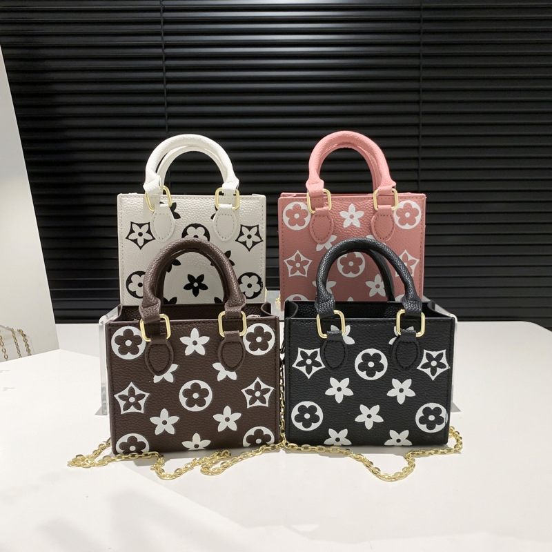 Designer Bags 2025 Spring/Summer New Small square Bag, Fashionable printed hand-held Ladies' bag, Stylish Star Chain bag free shipping