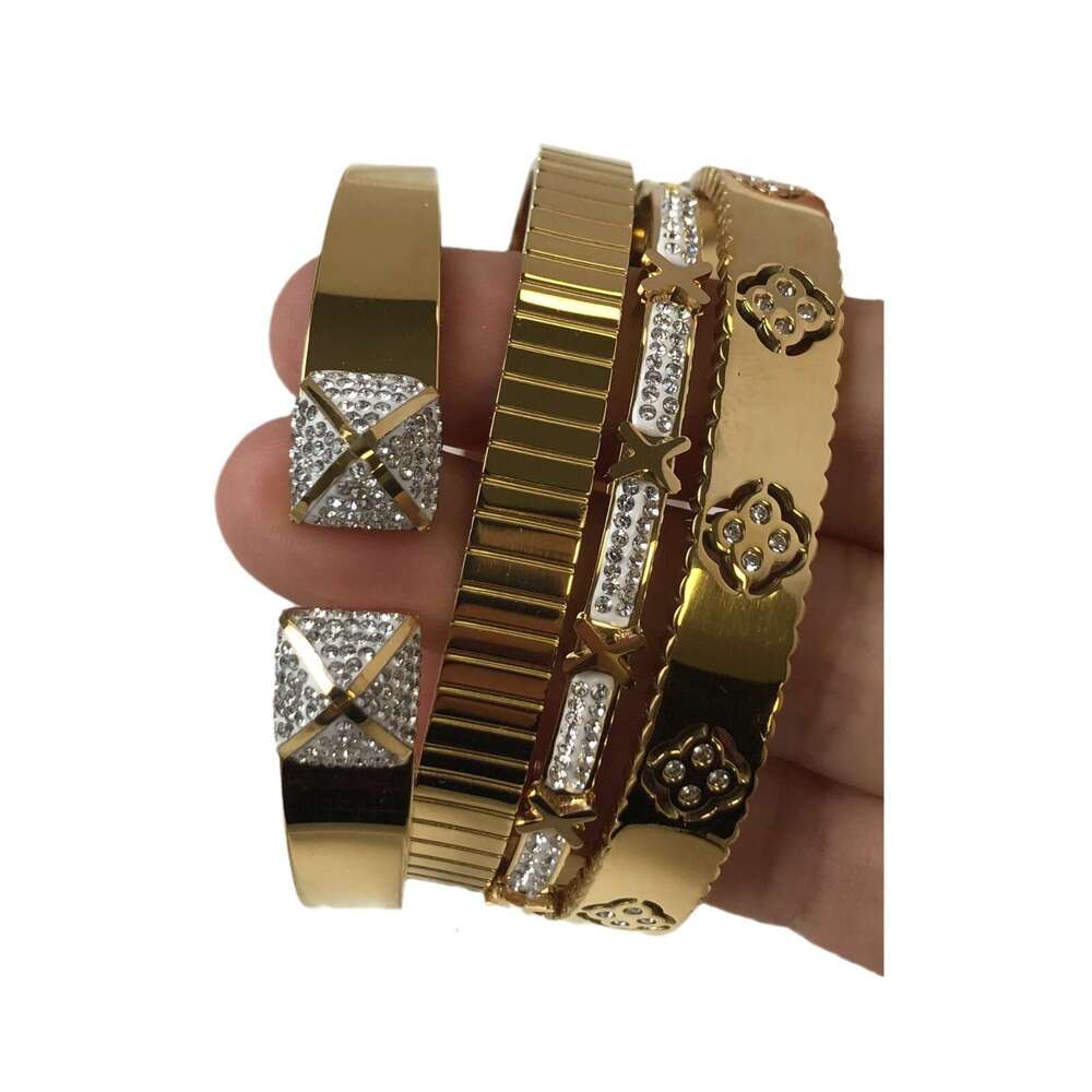 Hot selling Gold Tone Jewelry Four-Leaf Clover Designer Stainless Dia Set Zircon Bracelet Pagoda Opening Big Brand Bracele