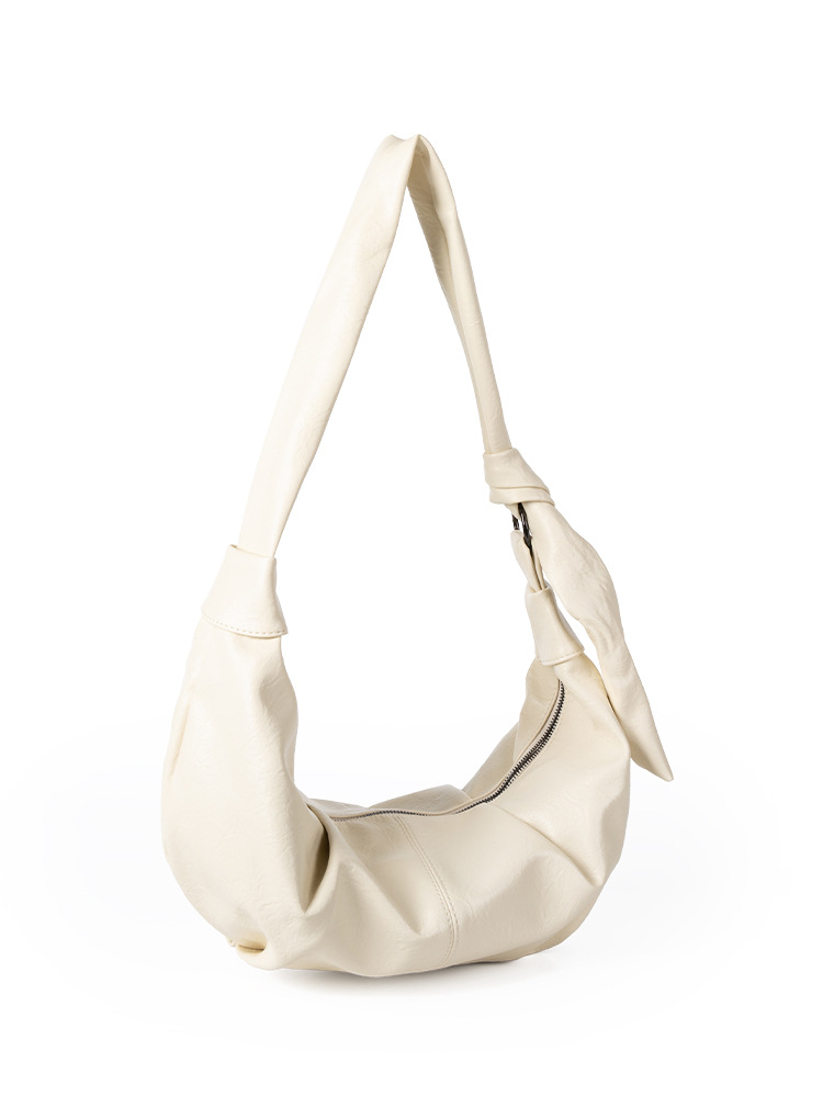 2025 New Korean Internet Celebrity Same Style Niche Texture Oil Wax Leather Women's Shoulder Crossbody For Commuting Versatile Dumpling Bag