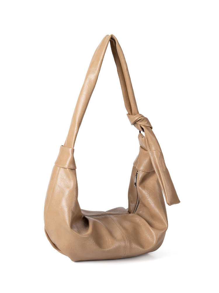 2025 New Korean Internet Celebrity Same Style Niche Texture Oil Wax Leather Women's Shoulder Crossbody For Commuting Versatile Dumpling Bag