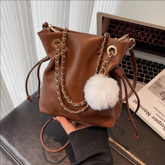New Fashion Bucket Bag Women s Fashion Handbag Women s Shoulder Bag Pulling Rope Chain design Women s Crossbody Bag Autumn New Designer Bag