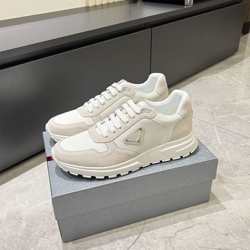 Designer Sneakers Prax 2.0 Re-Nylon And Suede Sneakers Triangle Logo Luxury Shoes Mens Womens Casual Shoes Recycled Polyamide Contemporary Lines 1E921N Tn Trainers