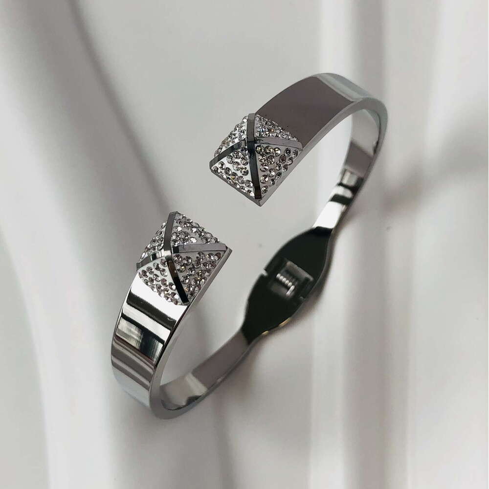 Hot selling Gold Tone Jewelry Four-Leaf Clover Designer Stainless Dia Set Zircon Bracelet Pagoda Opening Big Brand Bracele