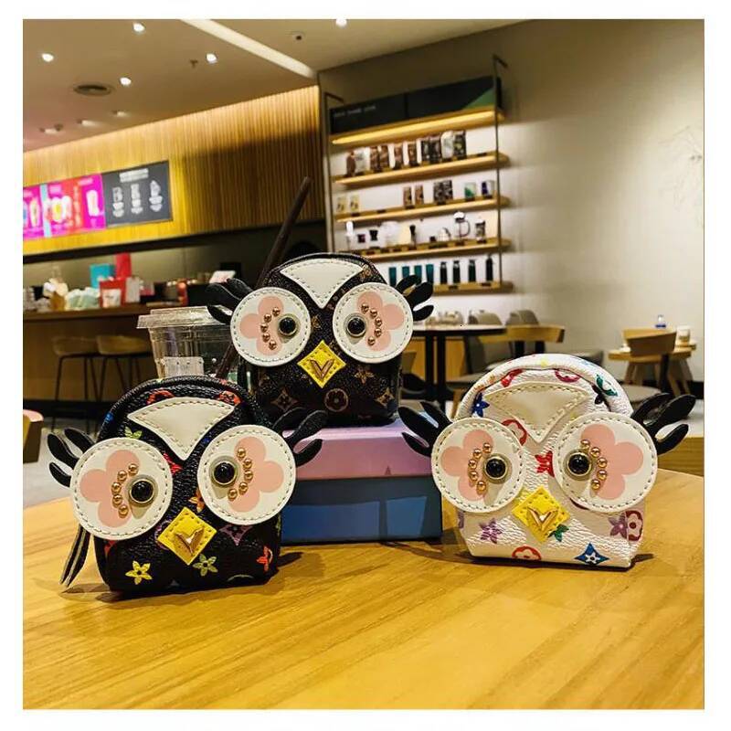 Bestseller Explosive owl headphone Small wallet pendant, keychain, light and high-end small bag ddmytues